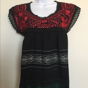 Red embroidered blouse